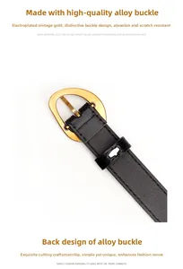 Detail of vintage gold plated alloy buckle on a premium black leather waist belt