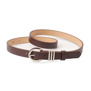Slim dark brown leather belt for women with a silver horseshoe buckle and decorative rings