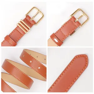 Ceinture en cuir marron avec boucle dorée et surpiqûres jaunes pour jeans femme