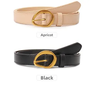 Detail of slim waist belts with matte gold geometric buckles in apricot and black colors