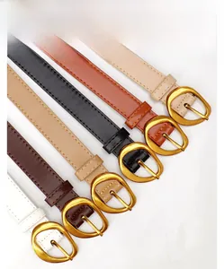 Detailed display of six thin leather belts with elegant golden oval pin buckles