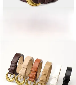 Detail showing various colors of women's belts with golden crescent moon buckles