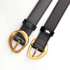 Women's black leather belts with stylish gold oval pin buckles and fine stitching details