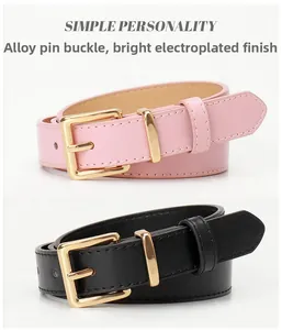 Detailed close-up of pink and black thin belts with glossy golden alloy pin buckles