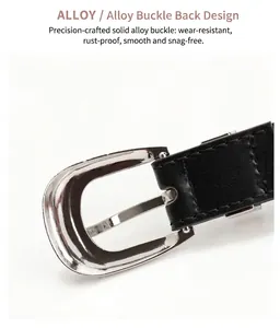Detail of solid alloy D-ring buckle back on a classic black leather women belt