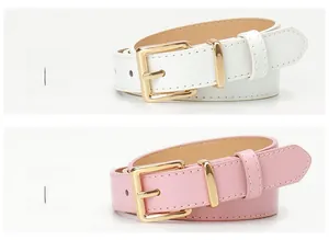 Detailed view of chic women's belts in white and pink with gold square pin buckles