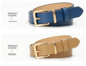 Detail of navy blue and khaki slim leather belts with white stitching and gold pin buckles