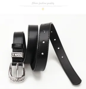 Retro women's black leather belt featuring an intricate engraved silver floral buckle