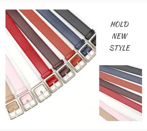 Detail of square matte silver buckle and neat stitching on multiple colored leather belts