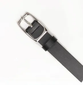 Detailed close-up of a premium black leather belt with a polished silver alloy pin buckle