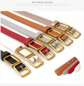 Detailed view of women skinny belts in six colors with elegant golden metal buckles
