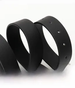 Close-up detail of high-quality black PU leather belt with smooth lychee grain texture
