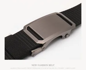 Detail of matte gunmetal alloy buckle and black nylon tactical woven belt texture