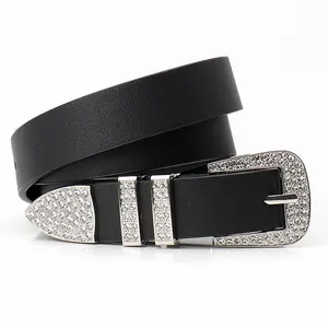 Black leather belt with silver rhinestone buckle and studs in western bohemian style