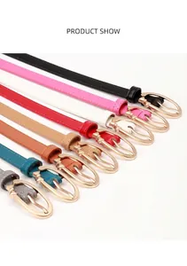 Detailed close-up of slim PU leather belts with sweet alloy bow buckles in eight colors