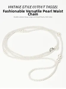 Detail of multilayer pearl waist chain featuring silver lobster clasps and lustrous beads