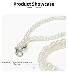 Detail of white pearl chain with dual metal lobster clasps for dresses and bags