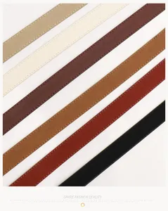 Detail shot of six slim suede belts in diverse colors like coffee, tan, and black