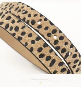 Close-up of leopard print belt with faux horse hair texture and durable punch holes