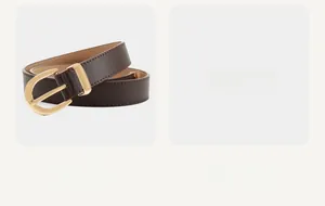 Detail of coffee brown leather belt with gold D-buckle and fine stitching craft