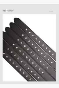 Detail of black leather belts with silver metal eyelets and litchi texture in rows