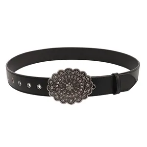 Vintage bohemian black leather belt with large silver floral buckle and metal eyelets