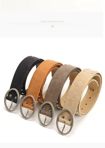 Detail of four colorful suede belts with double-row silver rivets and oval buckles