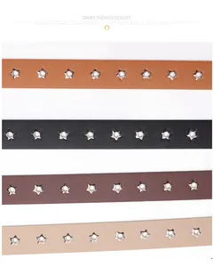 Detail view of slim leather belts in four colors with star-shaped silver metal eyelets