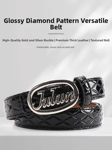 Close-up of a glossy quilted leather belt with a Julun embossed silver buckle