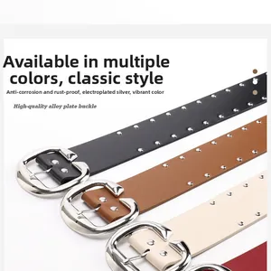 Detail of four vintage studded belts in black, brown, beige, and red with silver buckles