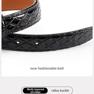Detail of black glossy belt with diamond lattice texture and oil-finished edges