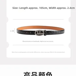 Detail view of black textured belt with Julun metal buckle, size 105cm by 2.4cm
