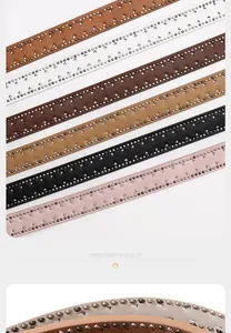 Detail of Y2K aesthetic faux leather belt featuring double-row studs and star cutouts