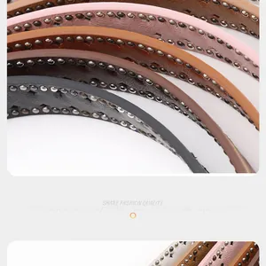 Detail of Y2K leather belts with double row punk metal rivets in various colors