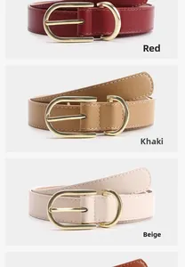 Dettaglio di eleganti cinture da donna in rosso, kaki e beige con fibbia ovale dorata