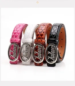 Close-up of four glossy quilted leather belts with silver Julun logo metal buckles