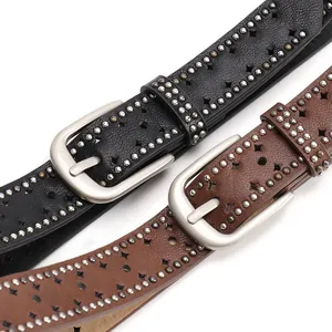 Y2K punk style black and brown leather belts with metal rivets and star cutouts