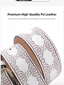 Detailed view of white vintage embossed PU leather belt with rustic metal buckle for jeans