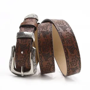 Ceinture vintage en cuir marron avec motifs papillons et boucle argentée gravée