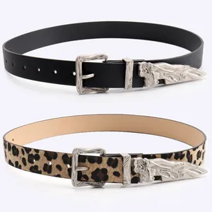 Retro carved buckle belts in black and leopard print with ornate silver metal details
