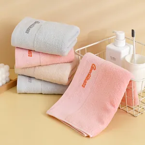 Thick cotton face towels in four colors with Goodness embroidery for bathroom use