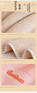 Macro detail of soft cotton loops and premium embroidery on absorbent face towels