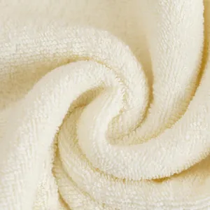 Serviette en coton du Xinjiang crème douce avec détails de texture éponge moelleuse