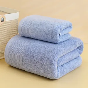 Three-piece light blue cotton towel set featuring absorbent bath and face towels