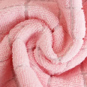 Pink soft cotton towel with grey checkered pattern and fluffy absorbent loop texture