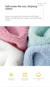 Close-up of thick combed cotton towel texture showing soft fibers and absorbent loops