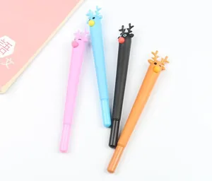 Detail of four colorful cartoon reindeer gel pens on a pink notebook for office and school