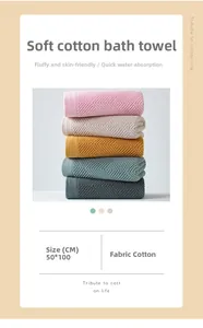 Detail of 50x100cm cotton bath towels in multiple colors with herringbone texture