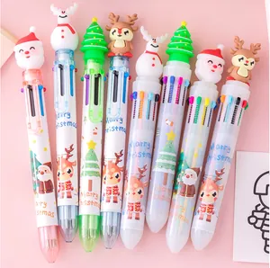 Detail of Christmas multi-color ballpoint pens with festive 3D characters and patterns