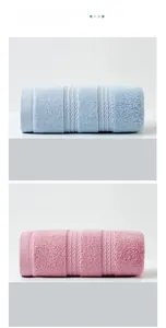 Detail of soft cotton towels with plush loops and elegant braided weave pattern